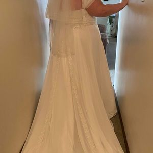 Plus Size 30 woman’s Aline chiffon wedding gown.